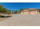 Spacious three-car garage with ample parking space at 2336 E Elk Bugle Trl, San Tan Valley, AZ 85140