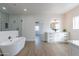 Modern bathroom with soaking tub, walk-in shower, and double vanity at 3909 S Veronica Ln, Gold Canyon, AZ 85118