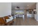 Open floor plan with spacious living area, kitchen, and views of the backyard at 3909 S Veronica Ln, Gold Canyon, AZ 85118
