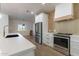 Modern kitchen with stainless steel appliances and white shaker cabinets at 3909 S Veronica Ln, Gold Canyon, AZ 85118