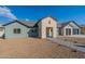 New construction home with a neutral color scheme and attractive landscaping at 3909 S Veronica Ln, Gold Canyon, AZ 85118