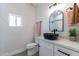 Modern bathroom with black vessel sink, white cabinets, and walk-in shower at 3909 S Veronica Ln, Gold Canyon, AZ 85118