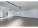 Spacious two-car garage with epoxy flooring and ample storage at 3909 S Veronica Ln, Gold Canyon, AZ 85118