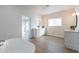 Modern bathroom with freestanding tub, double vanity and view to bedroom at 3909 S Veronica Ln, Gold Canyon, AZ 85118