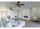 Living room with sectional sofa, fireplace, and views to the front entry at 3909 S Veronica Ln, Gold Canyon, AZ 85118