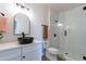Modern bathroom with black vessel sink, white cabinets, and glass shower at 3909 S Veronica Ln, Gold Canyon, AZ 85118