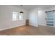 Simple dining area with wood flooring and sliding glass doors at 3909 S Veronica Ln, Gold Canyon, AZ 85118