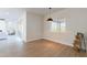 Dining area with wood flooring and a view from sliding glass doors at 3909 S Veronica Ln, Gold Canyon, AZ 85118