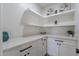Bright pantry with white cabinets and quartz countertops at 3909 S Veronica Ln, Gold Canyon, AZ 85118