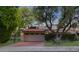 Spanish style home with tile roof, double garage and mature trees at 7285 E Arlington Rd, Scottsdale, AZ 85250