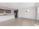 Modern kitchen features white countertops and dark brown cabinets at 10223 E Ulysses Ave, Mesa, AZ 85212
