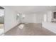 Bright and airy living room with wood-look floors and sliding glass doors at 10223 E Ulysses Ave, Mesa, AZ 85212