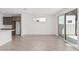 Open concept dining area with wood-look floors and access to backyard at 10223 E Ulysses Ave, Mesa, AZ 85212