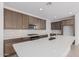 Modern kitchen with white quartz countertops at 10223 E Ulysses Ave, Mesa, AZ 85212
