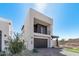 Modern two-story home with dark gray garage door at 10223 E Ulysses Ave, Mesa, AZ 85212