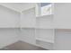 Bright walk-in closet with ample shelving and hanging space at 10223 E Ulysses Ave, Mesa, AZ 85212