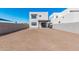 New construction home with a large backyard and covered patio at 10223 E Ulysses Ave, Mesa, AZ 85212