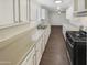 Clean kitchen with white cabinets and gas range at 4321 N 50Th Dr, Phoenix, AZ 85031