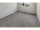 Empty bedroom with gray carpeting and white walls at 4321 N 50Th Dr, Phoenix, AZ 85031