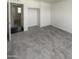 Spacious bedroom with ample closet space and neutral carpeting at 4321 N 50Th Dr, Phoenix, AZ 85031