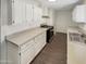 Clean kitchen, featuring white cabinets and gas range at 4321 N 50Th Dr, Phoenix, AZ 85031