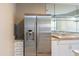 Stainless steel appliances and granite countertops highlight this modern kitchen at 15972 N 115Th Way, Scottsdale, AZ 85255