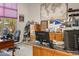 Bright home office with large desk and ample storage at 15972 N 115Th Way, Scottsdale, AZ 85255