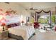 Spacious primary bedroom with large windows, sitting area, and home gym at 15972 N 115Th Way, Scottsdale, AZ 85255