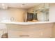 Modern kitchen with granite countertops and stainless steel appliances at 15972 N 115Th Way, Scottsdale, AZ 85255