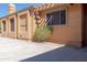 Casita exterior with stucco walls and pergola at 15972 N 115Th Way, Scottsdale, AZ 85255