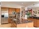 Kitchen features granite countertops, stainless steel appliances, and ample cabinet space at 15972 N 115Th Way, Scottsdale, AZ 85255