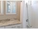 Bathroom with granite countertop and shower/tub combo at 15972 N 115Th Way, Scottsdale, AZ 85255