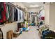 Large walk-in closet with ample shelving and space at 15972 N 115Th Way, Scottsdale, AZ 85255