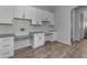 Home office with granite countertops and white cabinets at 2452 E Aloe Pl, Chandler, AZ 85286
