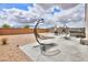 Spacious backyard with patio, hot tub, and seating area at 17078 N Rosemont St, Maricopa, AZ 85138