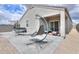 Large backyard with covered patio, hot tub, and seating at 17078 N Rosemont St, Maricopa, AZ 85138