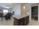 Island kitchen with granite countertops and ample cabinet space at 17078 N Rosemont St, Maricopa, AZ 85138