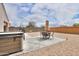 Outdoor patio with seating area and umbrella at 17078 N Rosemont St, Maricopa, AZ 85138