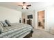 Spacious Primary bedroom with ensuite bathroom access and walk-in closet at 17078 N Rosemont St, Maricopa, AZ 85138