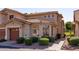 Two story home with attached garage and manicured landscaping at 5415 E Mckellips Rd # 56, Mesa, AZ 85215