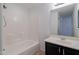 Bathroom with tub, shower and dark vanity at 5415 E Mckellips Rd # 56, Mesa, AZ 85215