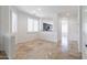 Open living room with tile floors and views of kitchen at 5415 E Mckellips Rd # 56, Mesa, AZ 85215
