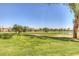Landscaped golf course view with pond at 5415 E Mckellips Rd # 56, Mesa, AZ 85215