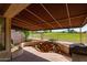 Relaxing patio with a water feature and grill at 5415 E Mckellips Rd # 56, Mesa, AZ 85215