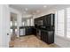Kitchen boasts dark wood cabinets, granite countertops, and stainless steel appliances at 5415 E Mckellips Rd # 56, Mesa, AZ 85215