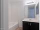 Clean bathroom with tub, vanity, and mirror at 5415 E Mckellips Rd # 56, Mesa, AZ 85215