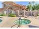 Community hot tub with surrounding landscaping at 5415 E Mckellips Rd # 56, Mesa, AZ 85215