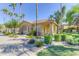 Two-story home with landscaping and palm trees at 5415 E Mckellips Rd # 56, Mesa, AZ 85215