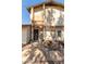 Two-story home with balcony and desert landscaping at 1765 S Fairway Cir, Casa Grande, AZ 85194