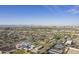 Aerial view of a city landscape featuring residential areas and a school at 1916 E Clarendon Ave, Phoenix, AZ 85016